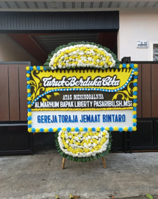 Papan Bunga Duka di Kelam Permai